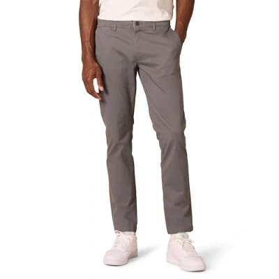 Image de Amazon Essentials Pantalon Chino en Tissu Stretch Confortable Délavé Coupe Skinny (Déjà Goodthreads) Homme, Gris, 32W / 32L