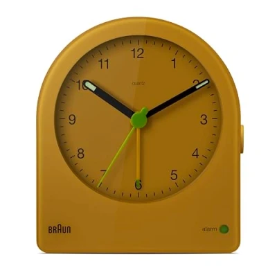 Image de Braun Réveil analogique Classique avec répétition (Fonction Snooze) et rétroéclairage continu, Mouvement Silencieux à Quartz, bip de l’Alarme en Crescendo, modèle BC22Y Jaune