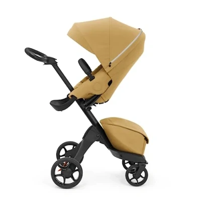 Image de Stokke Xplory X, Jaune Poussette de luxe Réglable pour le confort bébé et des parents Rembourrage, harnais fermeture éclair réfléchissante plus sécurité Se plie en un tournemain