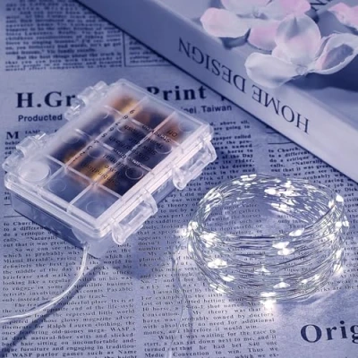 Image de Ariceleo Guirlande Lumineuse LED Étanche 20m, 1 Paquet, 200 Lumières de Fée à Piles, Fil Cuivre Blanc avec Télécommande, Minuterie &amp; Mode Scintillant, Idéal pour Chambre, Mariage, Noël