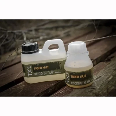 Image de Shimano Tx1 Food Syrup Attractant (500 ml) Tiger Nut Additifs bouillette