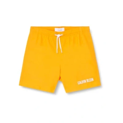 Image de Calvin Klein Jeans Short de Bain Garçon Medium Drawstring Print Mi Long, Orange (IP Water Reactive AOP), 10 12 Ans