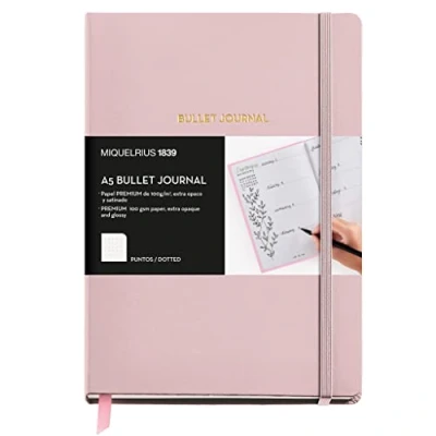 Image de Miquelrius Bullet Journal, Couverture rigide en simili cuir avec fermeture élastique, Carnet format A5 (148 x 210 mm), 96 Feuilles 100 g/m², Intérieur pointillé, Poche intérieure, Couleur rose