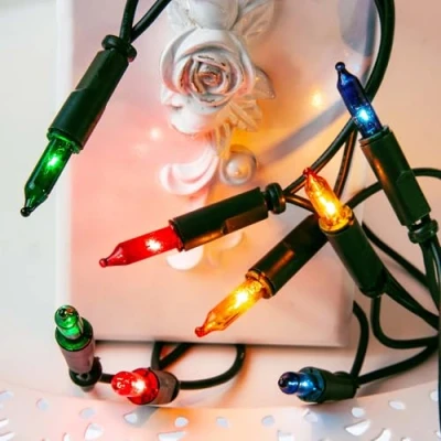 Image de Hellum Guirlande lumineuse intérieure alimentée en courant, mini 10e lumières multicolores, éclairée 1,35m, câble vert avec fiche pour Noël 831177