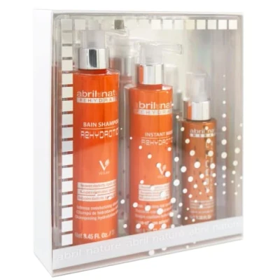 Image de abril et nature Set de Soins Capillaires Professionnels Rehydration Hydratation Maximale pour Cheveux Secs Pack Shampooing, Masque Sérum Restaure la Flexibilité l’Aspect Sain 550 ml