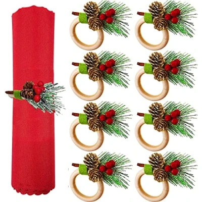 Image de KAHEIGN 8 Pièces Ronds de Serviette Noël, Porte Serviettes dn Bois avec Pomme Pin Baie Rouge Flocon Neige Boucle Rustique pour Décoration Table Mariage Noël Déjeuner Fête
