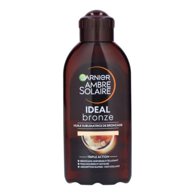 Image de GARNIER Ambre Solaire Huile Bronzante Intense Nourrit La Peau &amp; Prolonge Le Bronzage Éclat Douceur Absorption Rapide Parfum Coco Tous Types de Peaux 200 ml