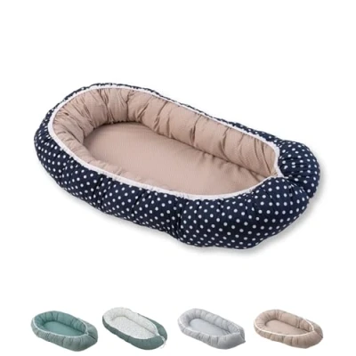 Image de Reducteur de lit bébé ULLENBOOM Baleines (55 x 95 cm) Cocon bébé, nid en coton, utilisable comme coussin pour e cale bebe