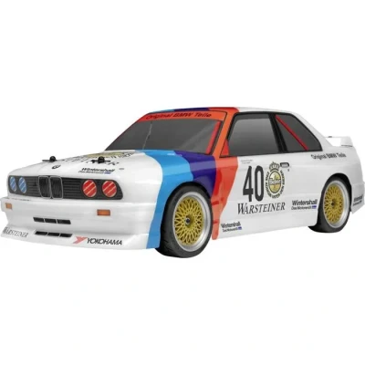 Image de Voiture de tourisme HPI Racing BMW M3 E30 Warsteiner 4 roues motrices 14 ans et plus