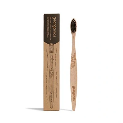 Image de Georganics Brosse à dents écologique et naturelle en bambou Poils doux charbon de bois