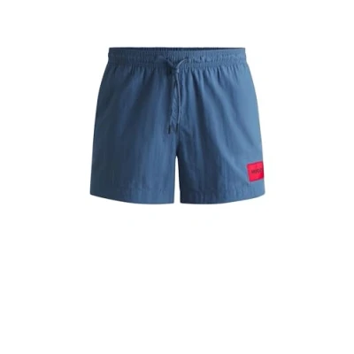 Image de HUGO Hommes Dominica Short de Bain à séchage Rapide avec étiquette logotée