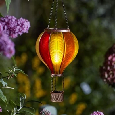 Image de Festive Lights Lanterne solaire Cool Fiesta réaliste à suspendre l&#039;extérieur SMD LED montgolfière en verre teinté effet flamboyant avec poignée (lanterne coucher de soleil)