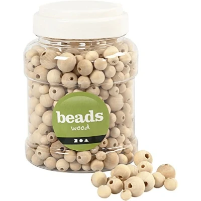 Image de Perles rondes en bois naturel de tailles diverses. Réf 68482