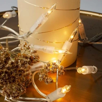 Image de hellum 831191 guirlande lumineuse d&#039;intérieur à alimentation électrique, mini avec 10 ampoules claires et chaudes, 1,35 m, câble transparent, lumières prise pour Noël