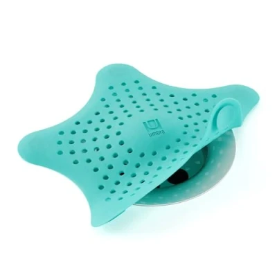 Image de UMBRA Starfish. Filtre à bonde de douche et bain Coloris bleu turquoise. Dimension 16.5x16.5x1.3cm.