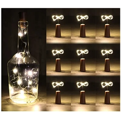 Image de com four® Lampe pour Bouteilles 9X LED Guirlande Lumineuse en Liège l&#039;intérieur, de Vin et Champagne Vides Mini Lampes avec Fonctionnement sur Batterie (09 pièces)