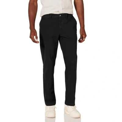 Image de Amazon Essentials Pantalon Chino Extensible, Style décontracté, Coupe Slim Homme, Noir, 31W / 28L