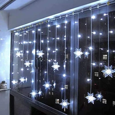 Image de Klighten Rideau Lumineux Flocon de Neige, 3.5M Guirlandes Lumineuses 96 LED 8 Modes d&#039;Eclairage, Decoration Fenêtre, Noël, Mariage, Anniversaire, Maison, Pati Blanc Froid