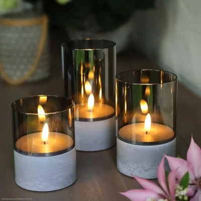 Image de hellum Bougies LED avec minuterie grises, set de 3 en différentes couleurs. LED, flamme vacillante, extérieure, piles 6xAA (non incluses) 10/12,5/15 x8cm (HxØ) 151992