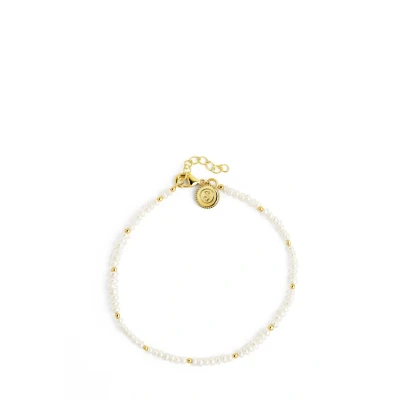 Image de SINGULARU Bracelet Pearls Dots. Acier avec plaqué or 18Kt et perles de culture d’eau douce. Longueur : 16 cm + 3 cm. Bijoux pour femme