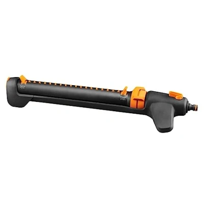 Image de Fiskars Arroseur Oscillant, avec Valve On/Off, Taille universelle, Jusqu&#039;à 17 x 21 m de portée, Noir/Orange, 1027028