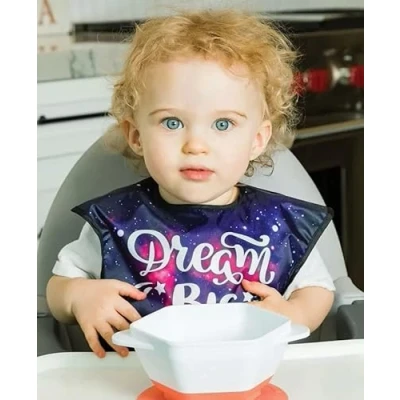 Image de Tiny Twinkle EB 01 Bavoir design innovant en Repeltex imperméable avec poche Dream Big 80 g
