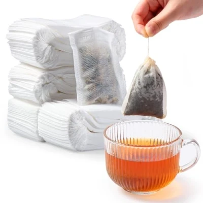 Image de Diboniur 400 Pièces Sachet The a Remplir Jetable En Tissu Non Tissé, 7 x 9 cm de avec Cordon Serrage pour Thé Vrac, Café, Fleurs, Herbes, Epices, Lavande