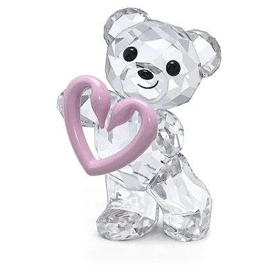 Image de Swarovski Figurine Ourson Una Kris révélant des cygnes entrelacés formant un cœur rose, en cristal