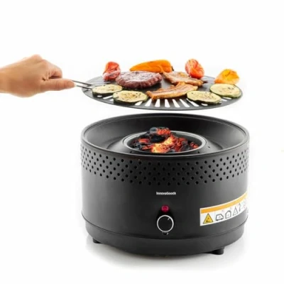 Image de InnovaGoods® barbecue de bureau, au charbon sans fumée ni odeur, grille portable pour cuisiner en intérieur et extérieur avec tous les conforts, adaptable piles ou connexion USB C.
