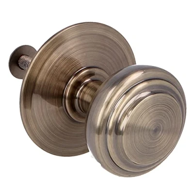 Image de Amig Bouton type 15 en laiton massif taillé avec finition cuir pour portes extérieures d&#039;entrée Diamètre poignée Ø70 mm · Hauteur 77 Livré vis et écrou de fixation