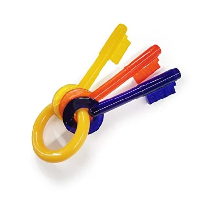 Image de Nylabone Jouet à mâcher pour chiots qui font leurs dents, en forme de clé, arôme bacon, les petits chiens/chiots (jusqu’à 11 kg), mâchouilleurs paisibles/qui dents.