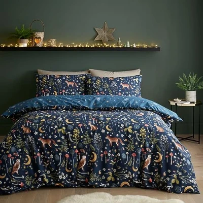 Image de Catherine Lansfield Parure de lit réversible avec Housse Couette et taies d&#039;oreiller Motif Animaux du crépuscule enchantés Bleu Marine
