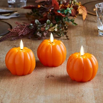 Image de Lights4fun Lot de 3 Bougies Cierges Citrouilles TruGlow® en Vrai Cire à LED Blanc Chaud Piles pour Intérieur