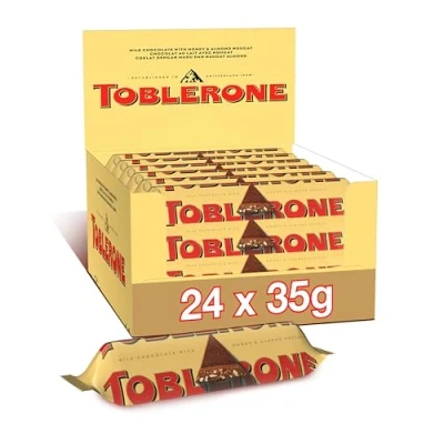 Image de Toblerone Barre au Chocolat Lait avec Nougat Miel et aux Amandes Recette Originale Format Familial Présentoir de 24 barres (24 x 35g)
