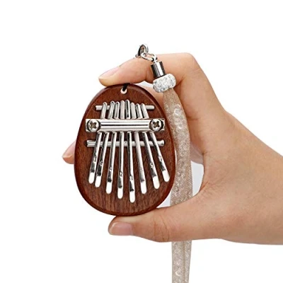 Image de Alnicov Piano à pouce Kalimba 8 touches, doigt en bois massif Super MiNi avec cordon adapté aux débutants anniversaire de Noël et autres occasions (forme ovale)