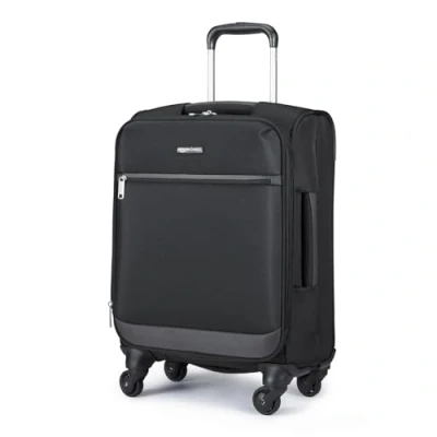 Image de Amazon Basics Bagage extensible à roulettes souples, 53 cm (4 incluses), 32 litres, jusqu’à 25 % de capacité supplémentaire, Noir