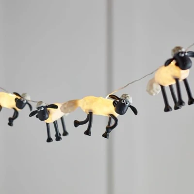 Image de Lights4fun Guirlande Lumineuse Shaun le Mouton™ avec 8 LED a Piles Décoration pour Chambre d&#039;Enfant Télécommande