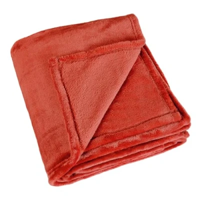 Image de LINDER Plaid rectangulaire Doux et cocooning Coloris Orange Brique 100% Polyester Dimensions 130x180cm Collection Cocoon