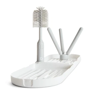Image de Munchkin Égouttoir de Voyage avec Brosse pour Biberon Séchage jusqu&#039;à 3 Biberons à la Fois Inclut une en Silicone Extensible Nettoyeur Tétine Intégré Essentiels Bébé