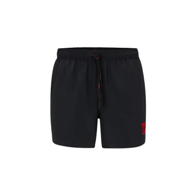 Image de HUGO Hommes Dominica Short de Bain entièrement doublé avec étiquette logotée Rouge
