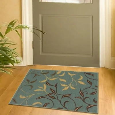Image de Ottomanson Tapis décoratif collection Ottohome dos en caoutchouc motif feuilles style contemporain 67 cm x 90 vert écume