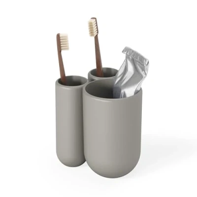 Image de UMBRA Toothbrush Holder Touch. Porte brosse à dents Plastique moulé. Coloris gris. Dimension 8.9x7.6x10.2cm