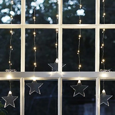 Image de Lights4fun Rideau Lumineux Étoiles 47 Micro LED Blanc Chaud