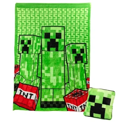 Image de Paladone Minecraft Creeper Couverture de Coussin 2 en 1 Voyage sous Licence Officielle Microsoft, Pliable, Douce et Moelleuse, Design Compact pour décoration Salon ou Chambre à